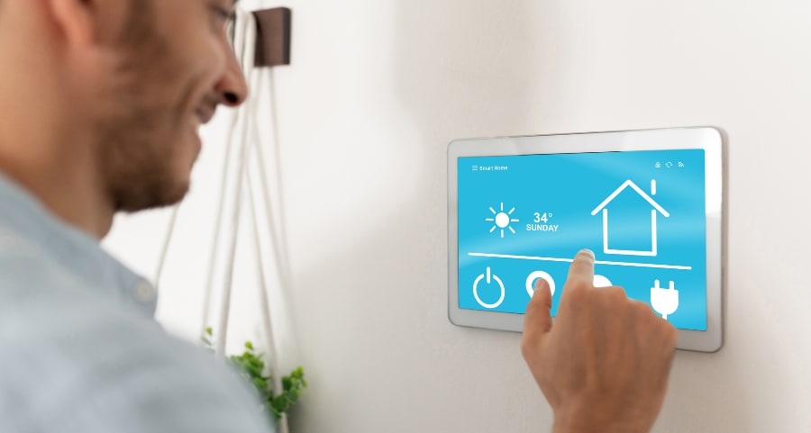 Man using smart home control panel