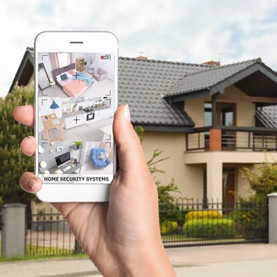 Jefferson City vivint phone display of cctv live feed in front of a house